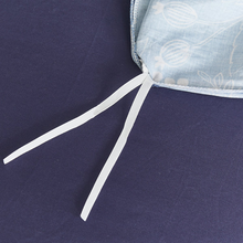Load image into Gallery viewer, Close-up of corner tie-down on navy blue duvet cover
