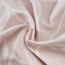 Load image into Gallery viewer, Pink fabric swirl texture close-up