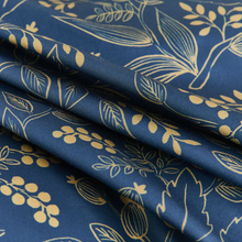 Load image into Gallery viewer, Close-up of navy blue fabric with gold botanical leaf and berry pattern