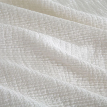 Load image into Gallery viewer, Close-up of cream waffle-weave fabric texture
