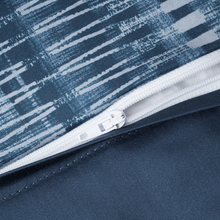 Load image into Gallery viewer, Zipper closure detail on blue duvet cover
