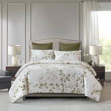 Load image into Gallery viewer, Duvet cover set with green leaf pattern styled on bed in bright bedroom
