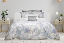 Load image into Gallery viewer, Botanical leaf print duvet cover set styled on a bed with matching pillowcases
